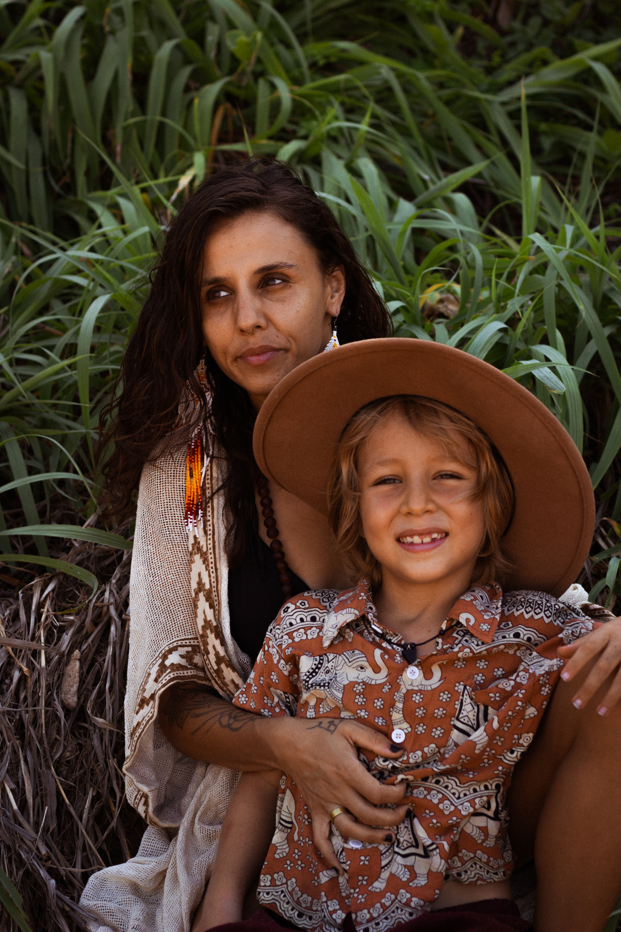 René with her son among tall grasses